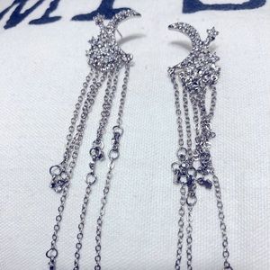 Silver dangling moon and star earrings